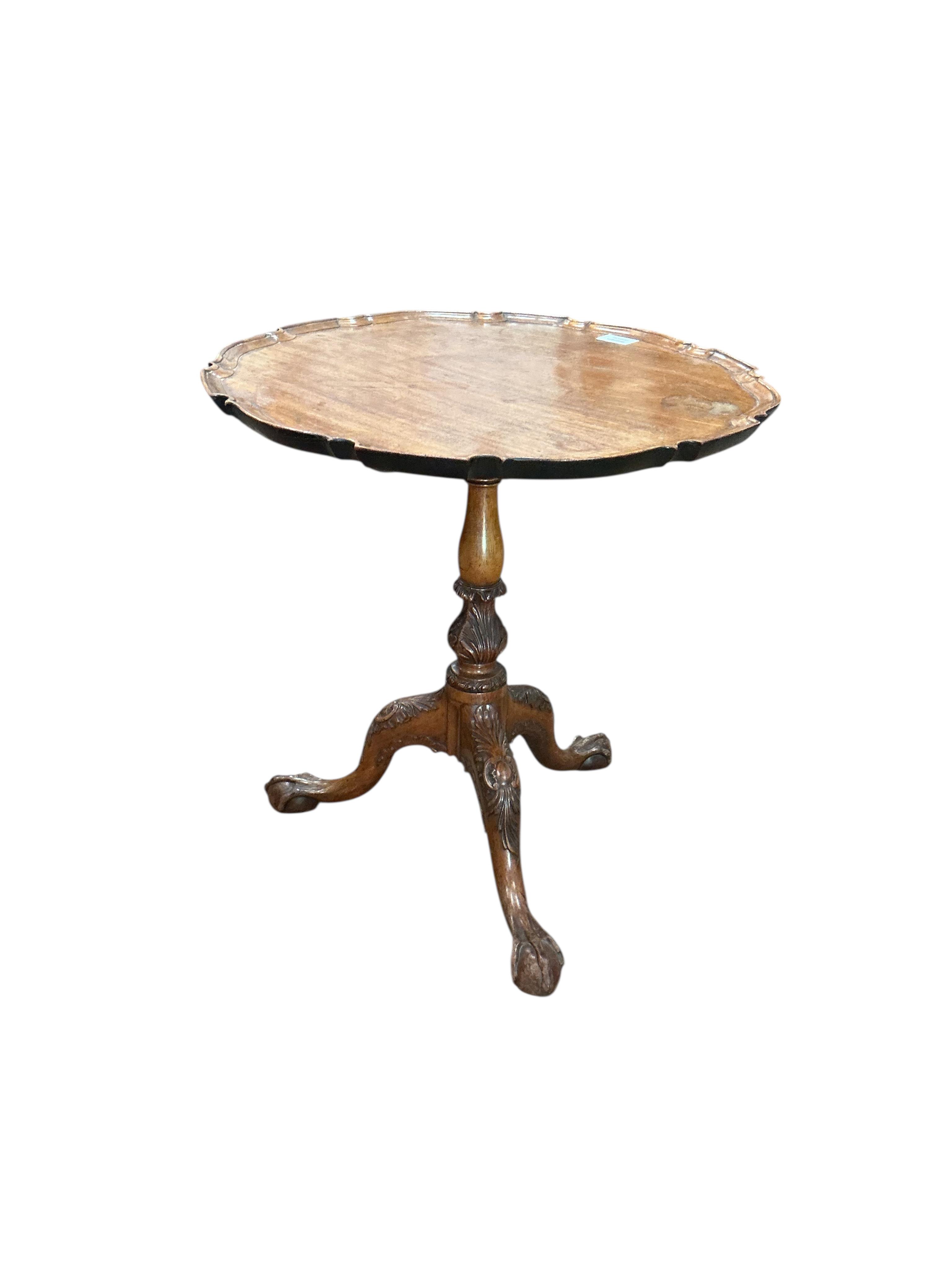 A small George III style circular tilt top mahogany tripod wine table, diameter 54cm, height 59cm
